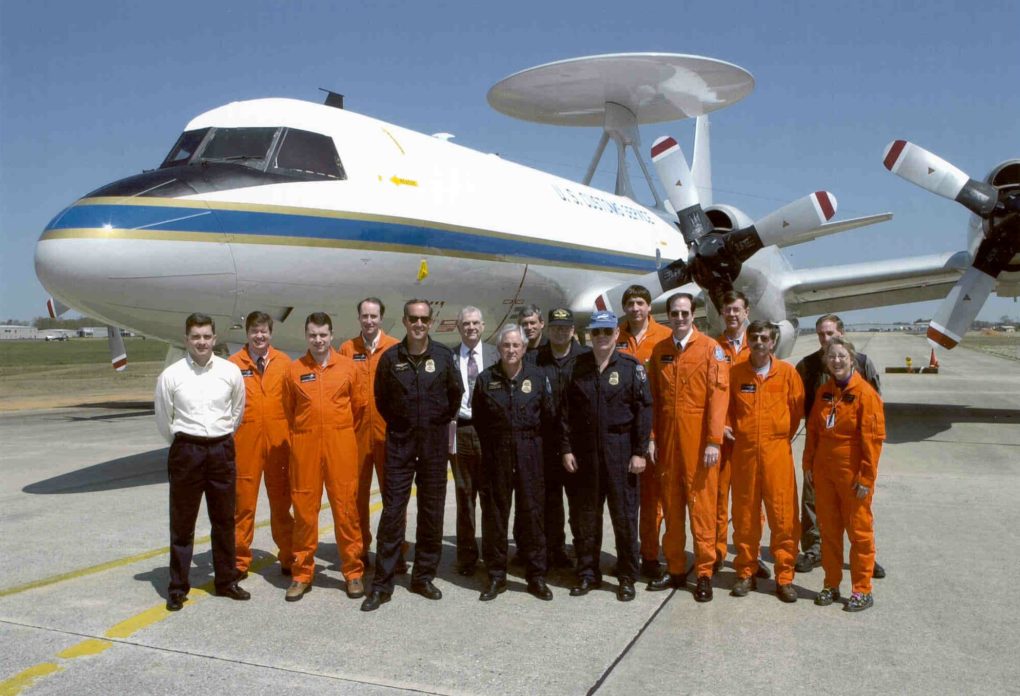 Carla Jackson poses with members of NAVAIR, Lockheed, and US Customs after a P-3 flight test